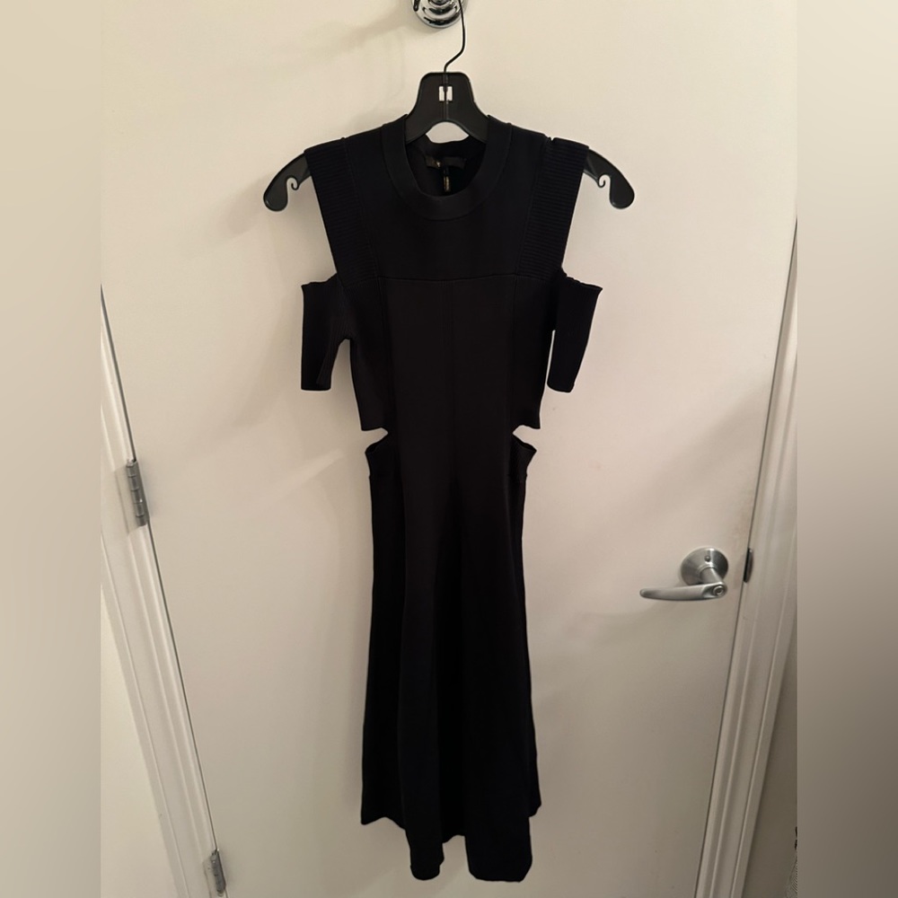 Black midi dress with shoulder and waist cut out